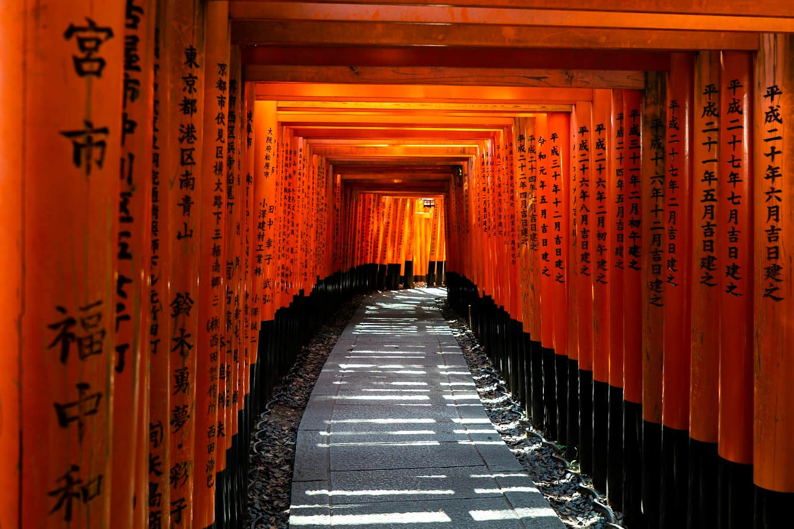 A tunnel of vermilion torii gates in Kyoto