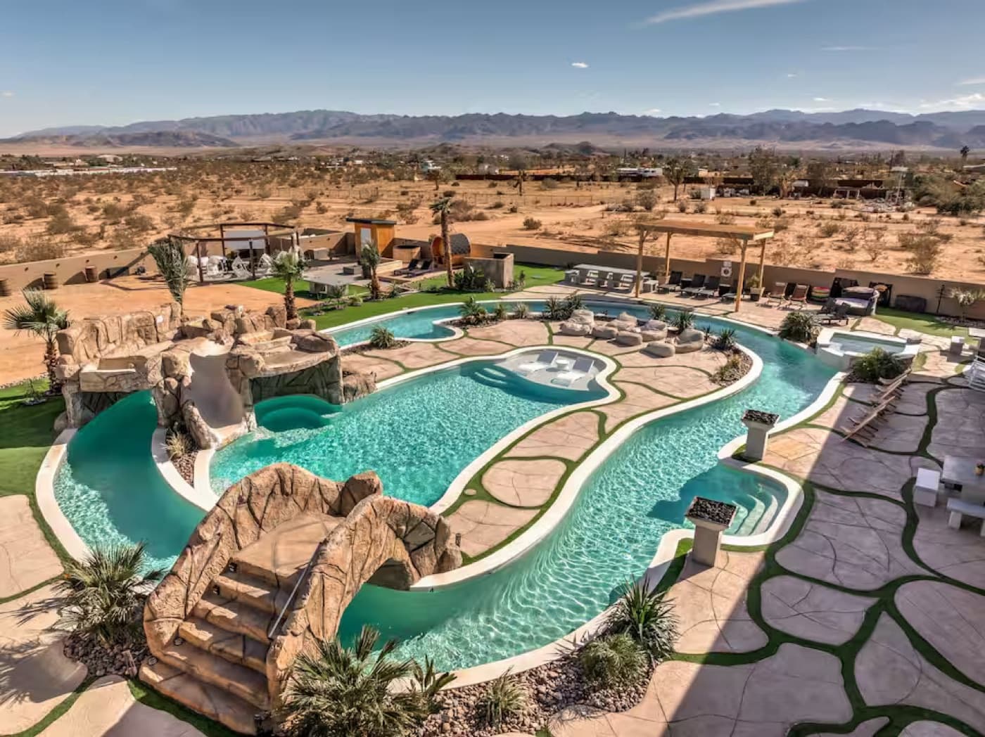 A desert estate with a winding private lazy river pool